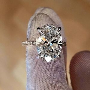 Solid 14k white and yellow gold 4.7ct G VS2 lab oval diamond ring